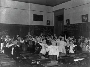 Hand Raised Prints: Children in classroom, (1899?). Creator: Frances Benjamin Johnston