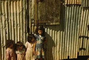 Walls Gallery: Children in a company housing settlement, Puerto Rico, 1941. Creator: Jack Delano