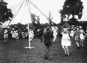 Images Dated 19th September 2007: Children dancing round a maypole, 1926