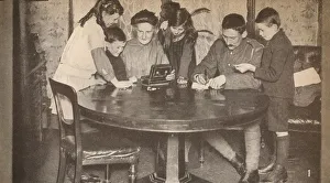 Associated Newspapers Ltd Gallery: Children emptying their money-boxes to invest in war loan, c1917, (1935)