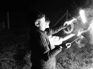 Firework Prints: Children with fireworks, c1955. Creator: Arthur Charles Kirby Ware