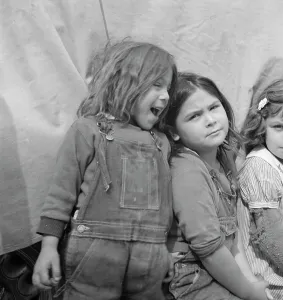 Children of migratory carrot pullers, Mexicans, Imperial Valley, California, 1937. Creator: Dorothea Lange