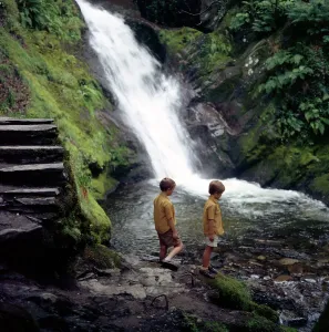 Two children at a pool, Dolgoch falls, Tal-y-llyn Valley, Snowdonia National Park, Wales Two children at a pool, Dolgoch falls, Tal-y-llyn Valley, Snowdonia National Park, Wales