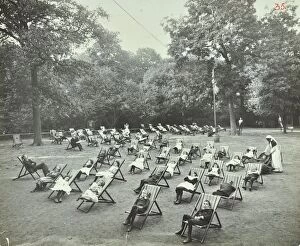 Guildhall Library Art Gallery: Children resting in deck chairs, Bostall Woods Open Air School, London, 1907
