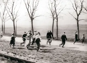 Noord Holland Prints: Children running alongside a canal, Monnickendam, Netherlands, 1898. Artist: James Batkin