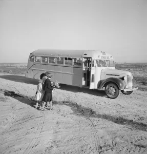 Dead Ox Flat Prints: Children get into school bus on a fall morning