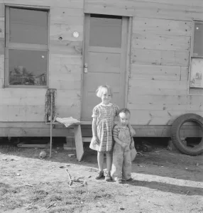 Migration Collection: The children, seen in opening of tent in earlier photograph... near Klamath Falls, Oregon, 1939