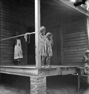 Living Conditions Prints: Children of turpentine worker near Cordele, Alabama, 1936. Creator: Dorothea Lange
