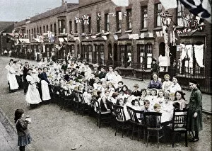A childrens tea party in an East End Street in London, to celebrate the Treaty of Versailles at t