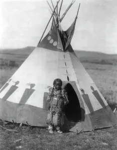 Blackfeet Prints: A child's lodge, c1910. Creator: Edward Sheriff Curtis