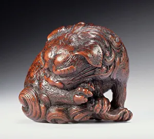 Cleaning Prints: Chinese Lion Chewing Its Paw, First half of 19th century. Creator: Tadatoshi