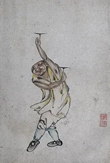 Spinning Prints: A Chinese man spinning plates on his index fingers