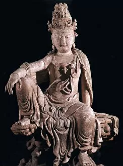 Buddhism Collection: Chinese statuette of Kuan-Yin as a Bodhisattva, 12th century