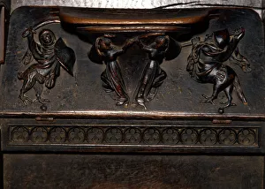Detail of the choir ashlar work of the Cathedral of Barcelona, made in oak wood, Reliefs of Mercy