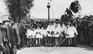 Choirboys of St Clement Danes beating the boundary-marks with long wands, London, 1926-1927 Choirboys of St Clement Danes beating the boundary-marks with long wands, London, 1926-1927