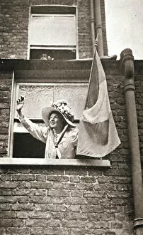 Strike Collection: Christabel Pankhurst waving to the hunger strikers from a house overlooking Holloway Prison, 1909
