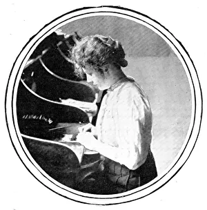 Tobacco Prints: The cigarette-maker: rolling, 1909. Creator: Unknown