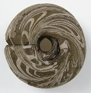 Swirling Prints: Circular Bead, Frankish, 500-600. Creator: Unknown