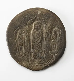 Circular plaque with Buddhist trinity on obverse..., Period of Division, Dated 500 CE Circular plaque with Buddhist trinity on obverse..., Period of Division, Dated 500 CE