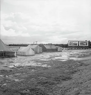 Muddy Prints: Citrus workers in winter quarters