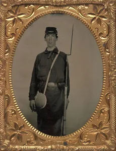 Ambrotype Prints: Civil War Union Soldier with Rifle and Canteen, in Studio, 1861-65. Creator: Unknown