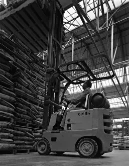 Animal Feed Gallery: A Clark forklift truck, Spillers Animal Foods, Gainsborough, Lincolnshire, 1962. Artist