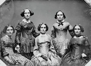 Clark sisters, five women, three-quarter length portraits, all facing front, between 1840 and 1860. Creator: Unknown