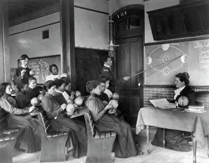 Training College Prints: A class in mathematical geography studying earth's rotation