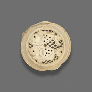 Clay filter with design of fish, Fatimid dynasty (969-1171), 11th-12th century. Creator: Unknown