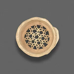 Clay filter with geometric design, Fatimid dynasty (969-1171), 11th-12th century. Creator: Unknown