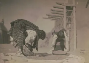 Cleaning Prints: Cleaning wheat-San Juan, c1905. Creator: Edward Sheriff Curtis