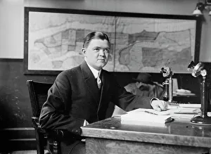 Phone Prints: Clement Driscoll seated at desk, 1910. Creator: Bain News Service