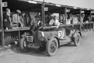 Clive Gallop and Leon Cushmans Aston Martin in the pits, JCC Double Twelve race, Brooklands, 1931