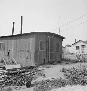 Shack Gallery: Close-up of present dwelling from which family will move into... near Yakima, Washington, 1939