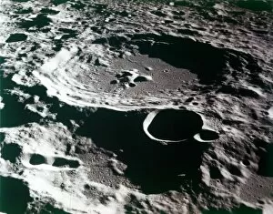 Shadow Collection: Close-up view of a crater on the surface of the Moon. Creator: NASA