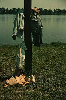 Clothes of swimmers hanging on a telegraph pole, Lake Providence, La., 1940. Creator: Marion Post Wolcott