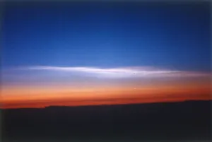 Clouds 39, 000 feet north of Stavanger, Norway, seen from DC-8 plane. Creator: NASA