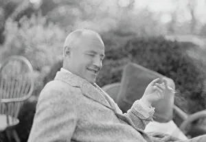 Edward W Prints: Clucas, E.W. seated outdoors, 1931 June 14. Creator: Arnold Genthe
