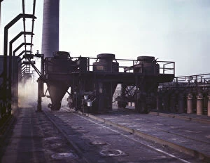 Coal feeders on tip of coke ovens...of the Great Lakes Steel Corporation, Detroit, Mich. 1942. Creator: Arthurs Siegel