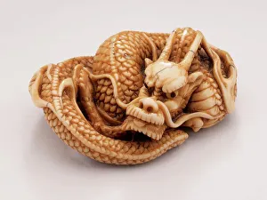 Inlaid Prints: Coiled Dragon, 18th century. Creator: Tomotada