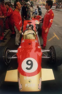 World Champion Prints: Colin Chapman and a mechanic in discussion over Graham Hill's Lotus