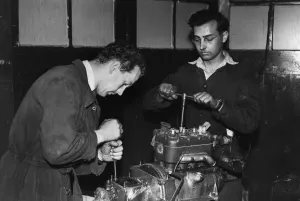 Colin Chapman with Peter Allen in Lotus workshop. Creator: Unknown Colin Chapman with Peter Allen in Lotus workshop. Creator: Unknown
