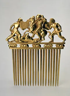 Comb with a fighting scene, c400 BC