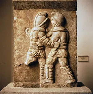 Combat between two gladiators, Roman relief from Epheseus, c3rd century Combat between two gladiators, Roman relief from Epheseus, c3rd century