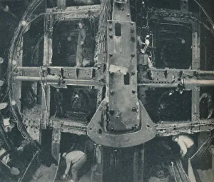 Our Wonderful World Prints: Compound Greathead Shield Destroying A Barrier Between Two Countries, c1935