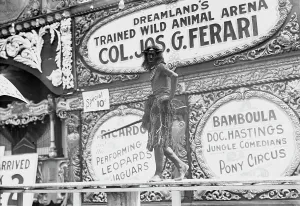Grass Skirt Prints: Coney Island, A Free Show, between c1910 and c1915. Creator: Bain News Service