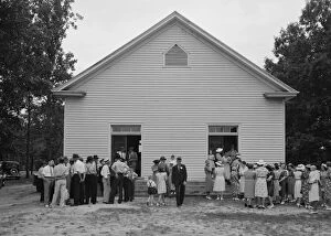 Group Of People Collection: Congregation gathers in groups...Wheeleys Church, Person County, North Carolina, 1939