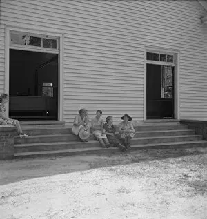 Conversation among members of congregation, Wheeleys Church, Gordonton, N Carolina, 1939. Creator: Dorothea Lange