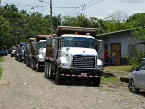 Costa Rican Prints: Convoy of Mack Trucks in Costa Rica 2018. Creator: Unknown