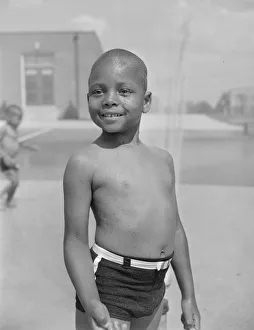 Gordon Roger Alexander Buchanan Parks Prints: Cooling off under the community sprayer